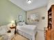 Cozy bedroom with large window and natural light and carpet flooring at 2571 Hunters Pl, Highlands Ranch, CO 80129