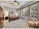 Spacious main bedroom with windows, plantation shutters and carpet flooring at 2571 Hunters Pl, Highlands Ranch, CO 80129