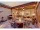 Enjoy the outdoor patio with comfortable seating, a built-in grill, and a cozy fire pit at 2571 Hunters Pl, Highlands Ranch, CO 80129