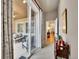 Enclosed patio with comfortable seating and views of the backyard at 2571 Hunters Pl, Highlands Ranch, CO 80129