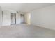 A spacious bedroom with carpeted floors and access to an en-suite bathroom at 7000 E Quincy Ave # 204, Denver, CO 80237