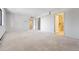 Spacious bedroom with neutral carpet, multiple closets, and an en-suite bathroom at 7000 E Quincy Ave # 204, Denver, CO 80237