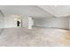 Spacious living room featuring neutral carpeting and recessed lighting at 7000 E Quincy Ave # 204, Denver, CO 80237