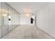 Spacious living room featuring neutral carpeting and ample space at 7000 E Quincy Ave # 204, Denver, CO 80237