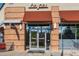 Modern restaurant exterior with 'Hapa Sushi' signage, glass doors, and a contemporary design at 7000 E Quincy Ave # 204, Denver, CO 80237