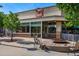 Outdoor patio at Ted's Montana Grill with comfortable seating and inviting fire pit, perfect for gathering at 7000 E Quincy Ave # 204, Denver, CO 80237