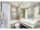 Stylish bathroom with combined shower and tub, sleek fixtures, and clean lines for modern comfort at 1201 Balsam Ave # 203, Boulder, CO 80304