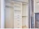 Organized closet space with shelves, drawers, and hanging rods offering ample storage solutions at 1201 Balsam Ave # 203, Boulder, CO 80304