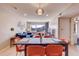 Bright open-concept space featuring hardwood floors, a dining area, a comfortable sofa, and scenic mountain views at 1201 Balsam Ave # 203, Boulder, CO 80304