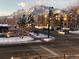 A beautiful mountain view over a snow-covered neighborhood in winter at 1201 Balsam Ave # 203, Boulder, CO 80304