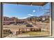 Scenic view from the window showcasing nearby mountains and the vibrant neighborhood surroundings at 1201 Balsam Ave # 203, Boulder, CO 80304