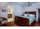 Cozy bedroom with wooden floors and ensuite bathroom at 100 N Gaylord St, Denver, CO 80206