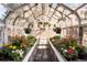 Bright greenhouse filled with colorful flowers and plants for year round greenery at 100 N Gaylord St, Denver, CO 80206