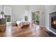 Bright main bedroom with vaulted ceiling, hardwood floors and glass sliding doors to deck at 1405 Castlepoint Circle, Castle Pines, CO 80108