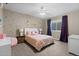 Charming bedroom is colorful and bright, with a large window and ample space at 1734 Summerglow Ln, Monument, CO 80132