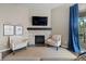 Comfortable living room area boasting a stone fireplace and relaxing seating at 1734 Summerglow Ln, Monument, CO 80132