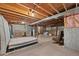 Partially finished basement, offering flexible storage and living space at 220 S Julian St # C, Denver, CO 80219