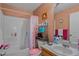 Clean bathroom with shower/tub combo and updated vanity at 220 S Julian St # C, Denver, CO 80219