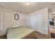 Bedroom with double bed, carpet, window, and double door closet at 220 S Julian St # C, Denver, CO 80219