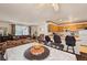 Dining area with kitchen access and view into living room at 220 S Julian St # C, Denver, CO 80219