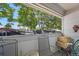 Private patio with metal chairs, offering a relaxing outdoor space at 220 S Julian St # C, Denver, CO 80219