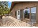 Large back deck features beautiful mountain views and outdoor seating area at 24 Ski Pole Ct, Breckenridge, CO 80424