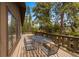 Outdoor dining on a spacious wooden deck offers an ideal spot to entertain guests at 24 Ski Pole Ct, Breckenridge, CO 80424