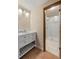 Bathroom with a white vanity and a glass-enclosed shower with white subway tile at 24 Ski Pole Ct, Breckenridge, CO 80424
