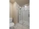 Bathroom featuring a tiled shower with a glass door, complemented by modern fixtures at 24 Ski Pole Ct, Breckenridge, CO 80424