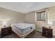 Bedroom with modern decor, showcasing a bed with bedside tables and ample natural light at 24 Ski Pole Ct, Breckenridge, CO 80424