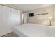 Bedroom featuring a built-in closet and a wall-mounted TV, offering a cozy retreat at 24 Ski Pole Ct, Breckenridge, CO 80424