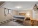 Cozy bedroom featuring natural light, neutral color palette and comfortable carpet flooring at 24 Ski Pole Ct, Breckenridge, CO 80424