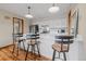 Charming kitchen with a large island, stainless steel appliances, pendant lighting, and ample counter space at 24 Ski Pole Ct, Breckenridge, CO 80424