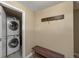 Convenient laundry room with stacked washer and dryer units for efficient space saving at 24 Ski Pole Ct, Breckenridge, CO 80424