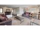 Inviting living room with a cozy seating area, fireplace, and neutral decor at 24 Ski Pole Ct, Breckenridge, CO 80424