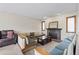 Comfortable living area features custom built in seating and a brick fireplace at 24 Ski Pole Ct, Breckenridge, CO 80424