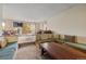 Large living area features built in seating, and large windows for natural light at 24 Ski Pole Ct, Breckenridge, CO 80424