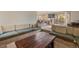 Spacious living area features built in seating, a fireplace, and large windows for natural light at 24 Ski Pole Ct, Breckenridge, CO 80424