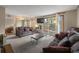 Comfortable living room with plush sofas, a coffee table, and views of the outdoor scenery at 24 Ski Pole Ct, Breckenridge, CO 80424