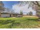 Spacious backyard featuring a covered patio and a privacy fence at 3576 S Holly St, Denver, CO 80237
