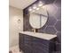 Stunning bathroom with vanity and modern fixtures at 3576 S Holly St, Denver, CO 80237
