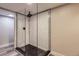 New and modern bathroom shower with black trim at 3576 S Holly St, Denver, CO 80237
