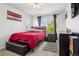Comfortable bedroom with plush bedding, ample natural light, and stylish decor at 2933 Central Park Blvd, Denver, CO 80238