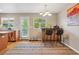 Cozy kitchen nook featuring bar seating, modern appliances, and a view to the backyard at 2933 Central Park Blvd, Denver, CO 80238