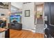 Inviting living room showcasing hardwood floors, a fireplace, and staircase at 2933 Central Park Blvd, Denver, CO 80238