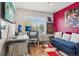 Stylish office with a contemporary desk setup and comfortable blue sofa at 2933 Central Park Blvd, Denver, CO 80238
