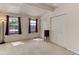 Bright bedroom featuring three windows and a closet at 8144 Washington St # 192, Denver, CO 80229