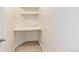 Walk-in closet with carpet, shelves, and natural light at 8144 Washington St # 192, Denver, CO 80229