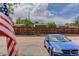 Parking lot with designated parking spaces in front of a wooden fence with residential buildings in the background at 8144 Washington St # 192, Denver, CO 80229