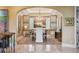 Elegant dining room featuring a chandelier, large painting, and beautiful rug, creating a sophisticated atmosphere at 5335 E 2Nd Ave, Denver, CO 80220
